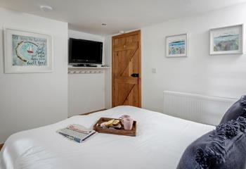 Pretty coastal artwork reflects the seaside location of Rock House.