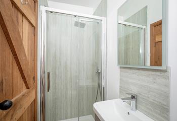 Enjoy hot showers under the luxurious rainfall showerhead!