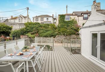 Throw open the French doors to the roof terrace, for a bright and airy extended living space.
