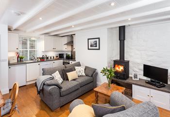 The cosy open plan living area in this charming cottage offers the perfect setting to escape from it all.