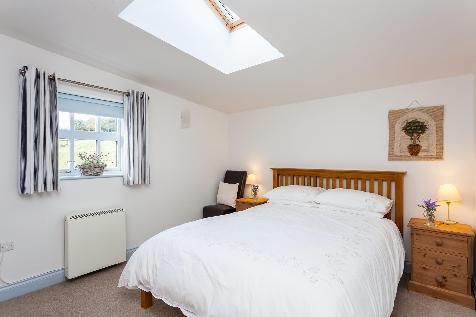 With its quiet location, you can expect a blissful night's sleep in this cosy king size bed.