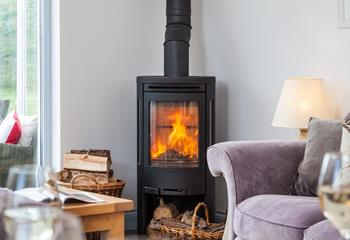 On cooler evenings light the woodburner and curl up together for a family movie night!