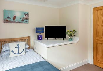 The bedrooms are decorated with seaside themes.