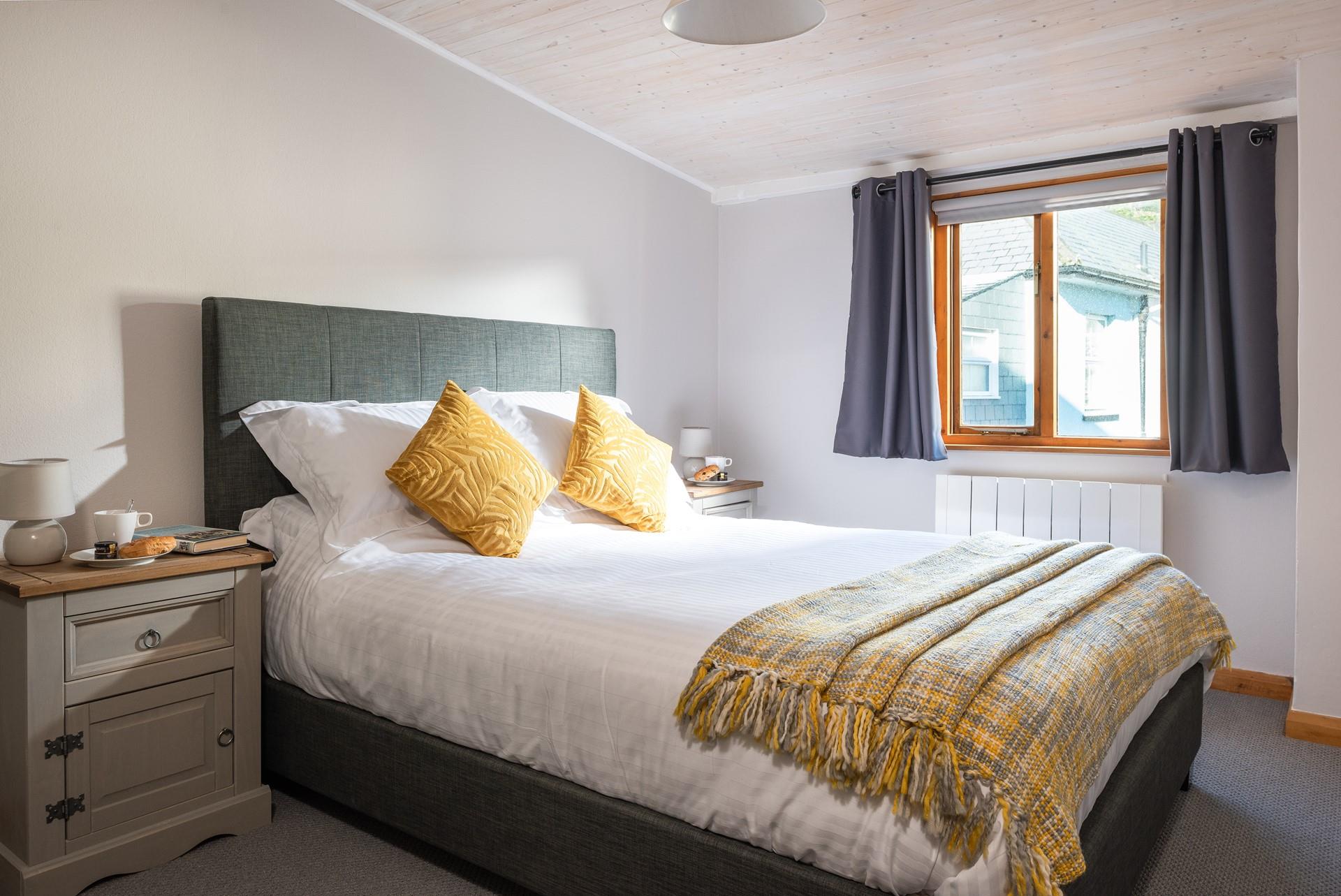 Relax in the sumptuous king size bed. 