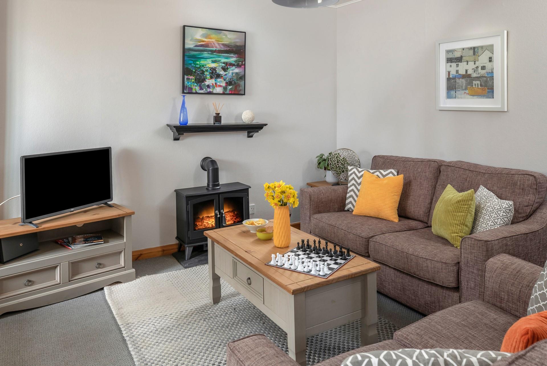 Cosy up in front of the electric fire and settle in for a relaxing evening. 