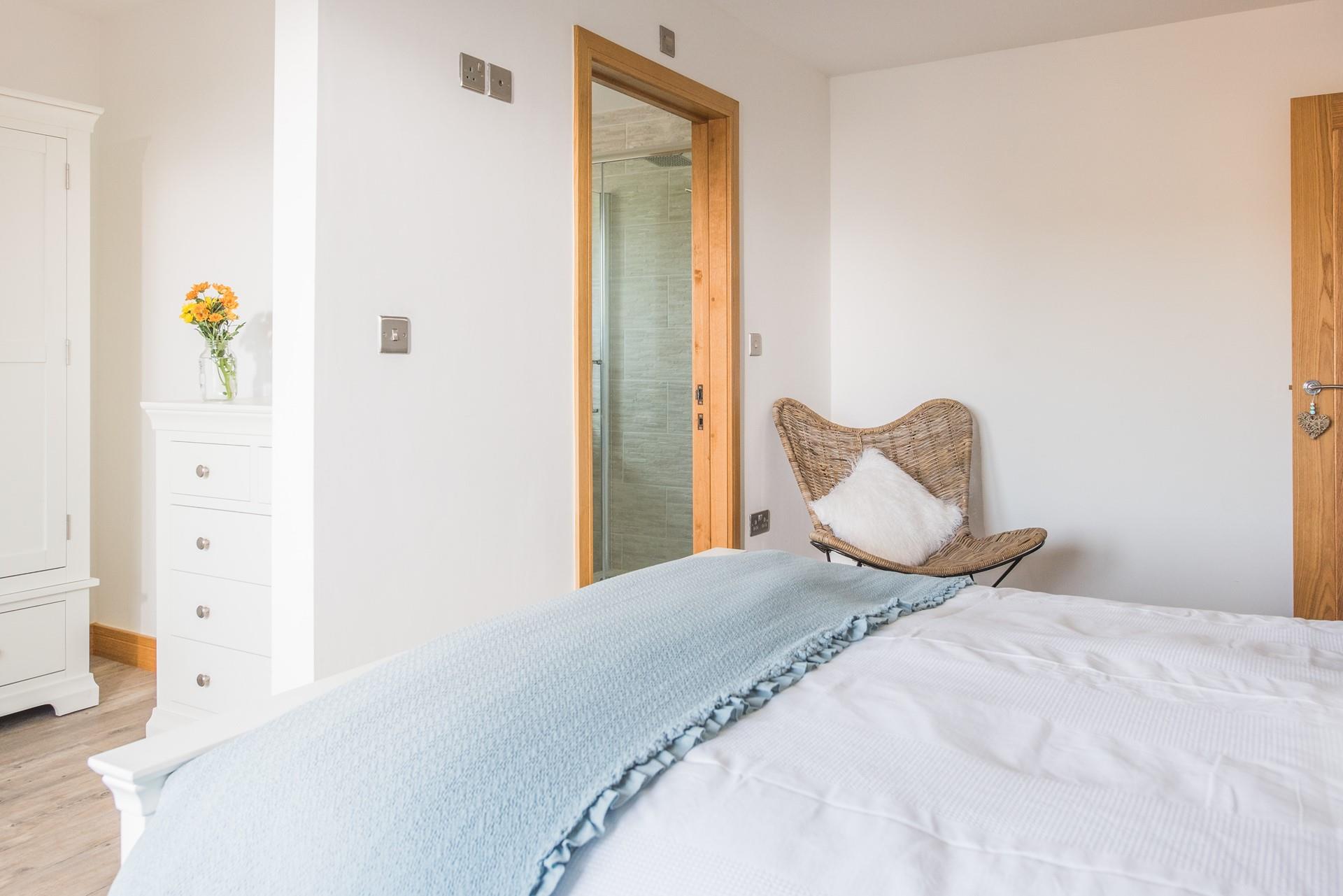 Bedroom 1 is very spacious, with plenty of storage and its own en suite shower.