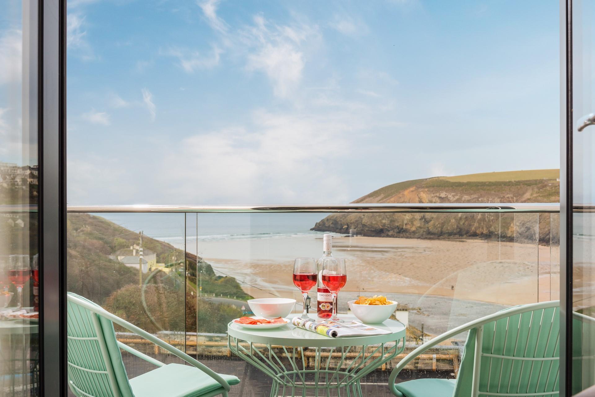 With its incredible views, the balcony is the perfect spot for an evening sundowner.