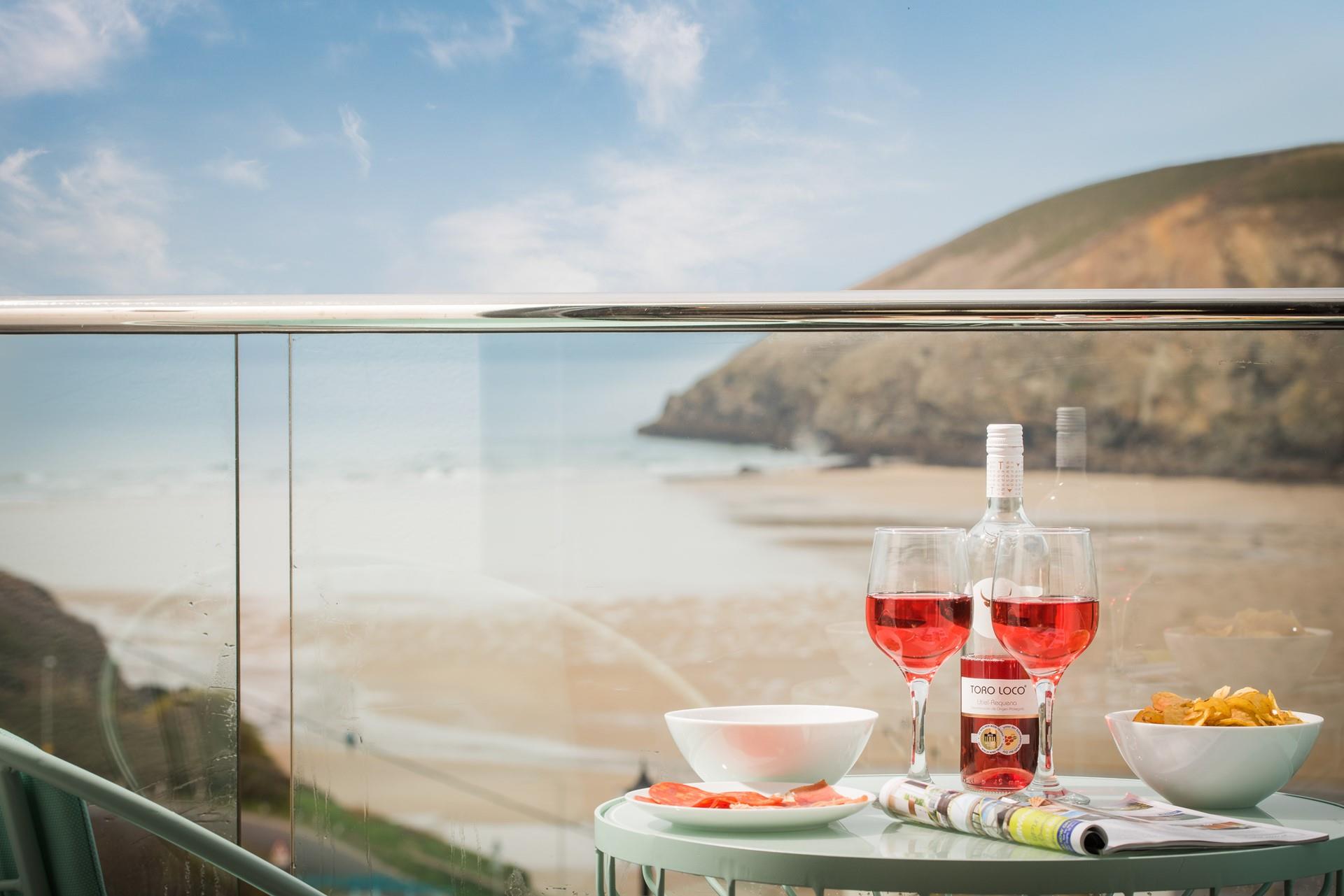 Pour yourself a glass of your favourite drink and watch the spectacular sunset over Mawgan Porth beach from your own balcony.