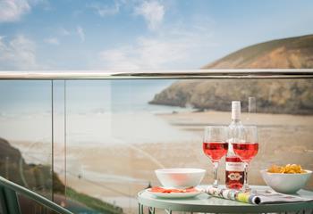 Pour yourself a glass of your favourite drink and watch the spectacular sunset over Mawgan Porth beach from your own balcony.