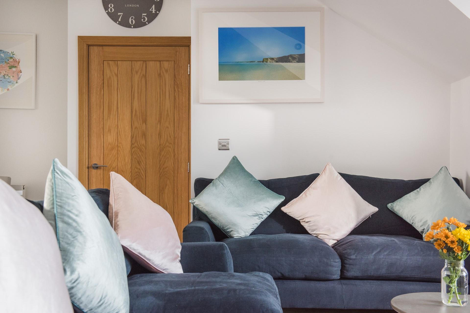 Snuggle up on the sofa and enjoy a film together after a fun-filled day at the beach.