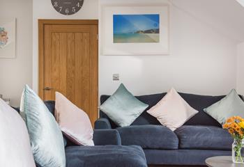 Snuggle up on the sofa and enjoy a film together after a fun-filled day at the beach.