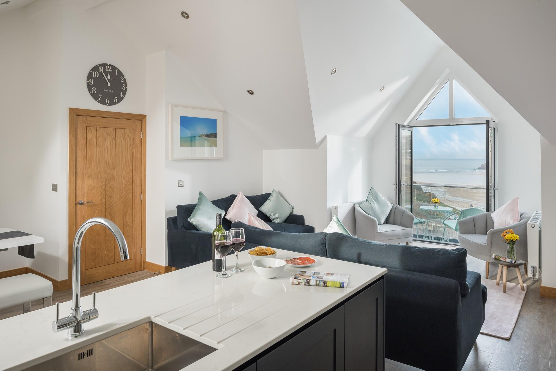 Kick back and relax to the sound of the surf in the luxurious open plan living area. 