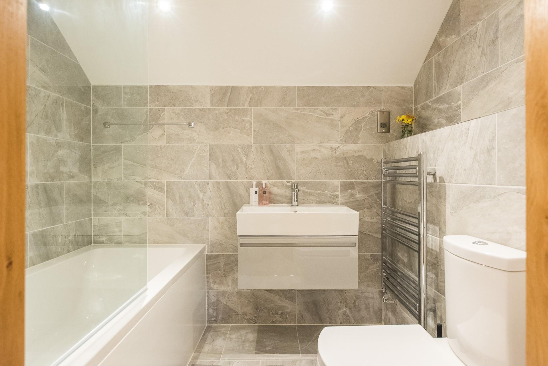 Sink into a bubble bath after a day spent exploring the coastline or catching waves on the beach. 