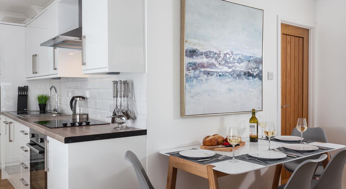 Tuck into hearty meals at the dining table each evening.