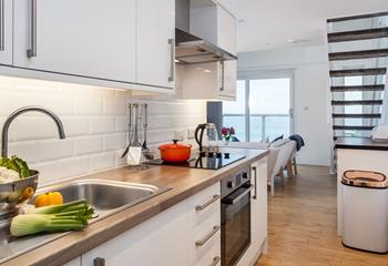 Cook up a storm in this functional and stylish kitchen.