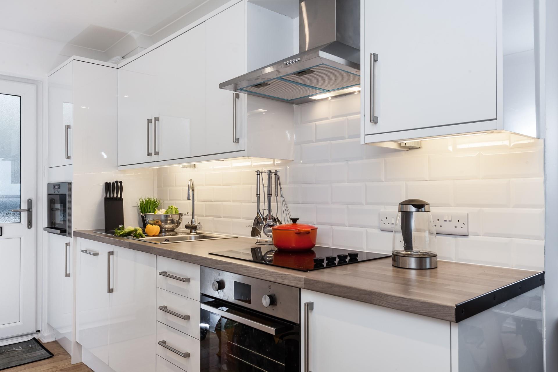 The kitchen is fully equipped for cooking tasty meals and preparing picnics for days out.