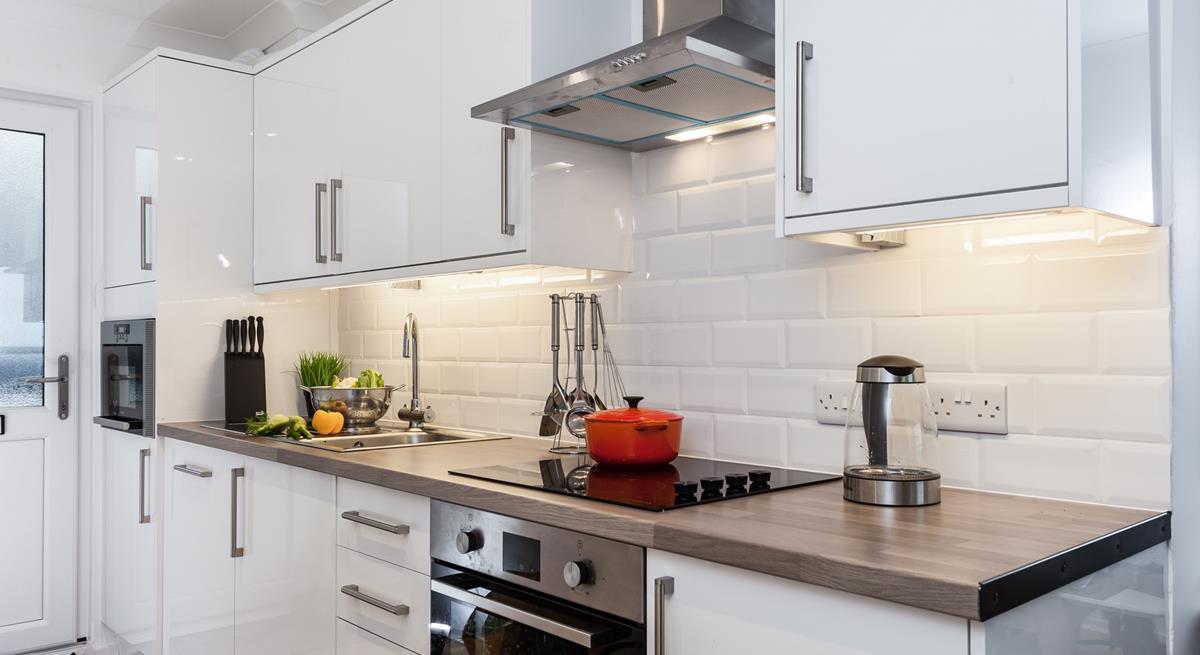 The kitchen is fully equipped for cooking tasty meals and preparing picnics for days out.