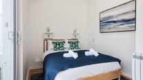 Bedroom 2 has a spacious double bed for resting each night.