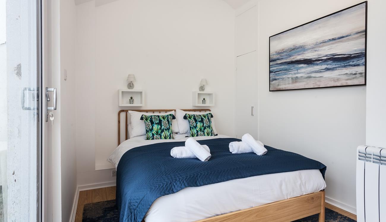 Bedroom 2 has a spacious double bed for resting each night.