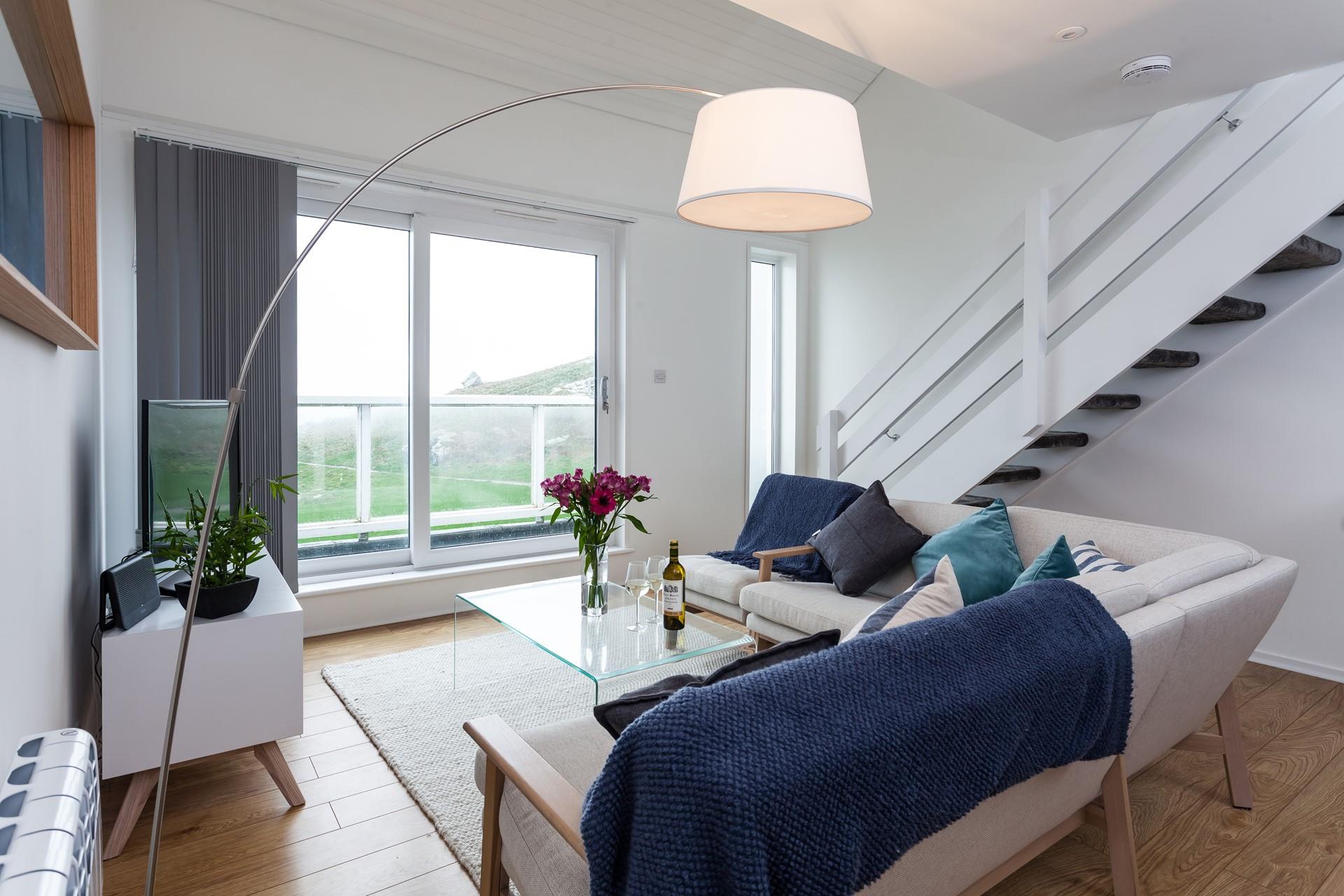 The comfortable sitting room is perfect for relaxing in the evenings.