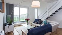 The comfortable sitting room is perfect for relaxing in the evenings.