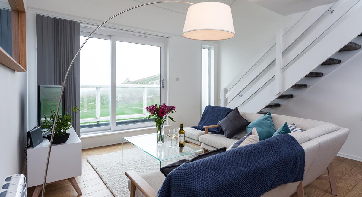 The comfortable sitting room is perfect for relaxing in the evenings.