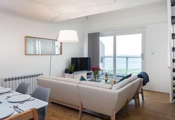 Sink into the corner sofa and enjoy the views over Porthmeor.