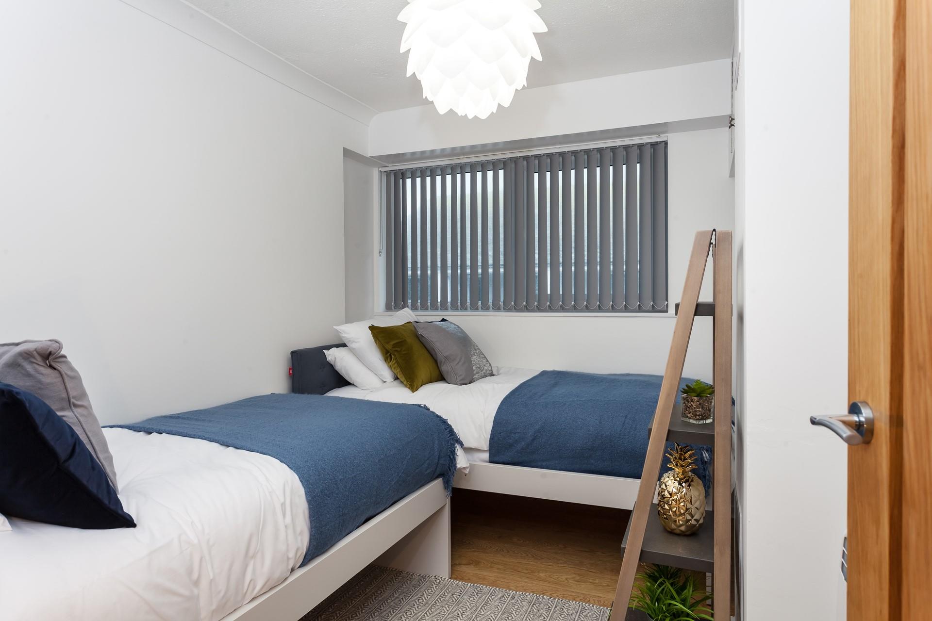 The twin bedroom is perfect for young adults or children to tuck into.