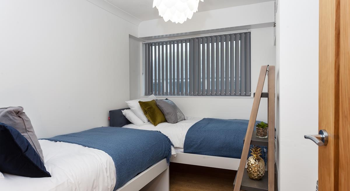 The twin bedroom is perfect for young adults or children to tuck into.