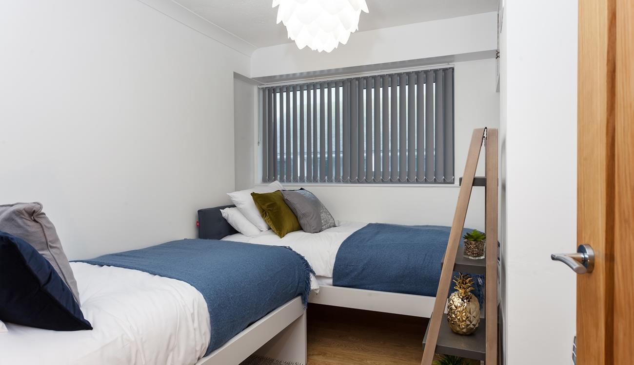 The twin bedroom is perfect for young adults or children to tuck into.