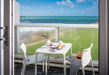 Start the day with pastries on the balcony with a sea view.