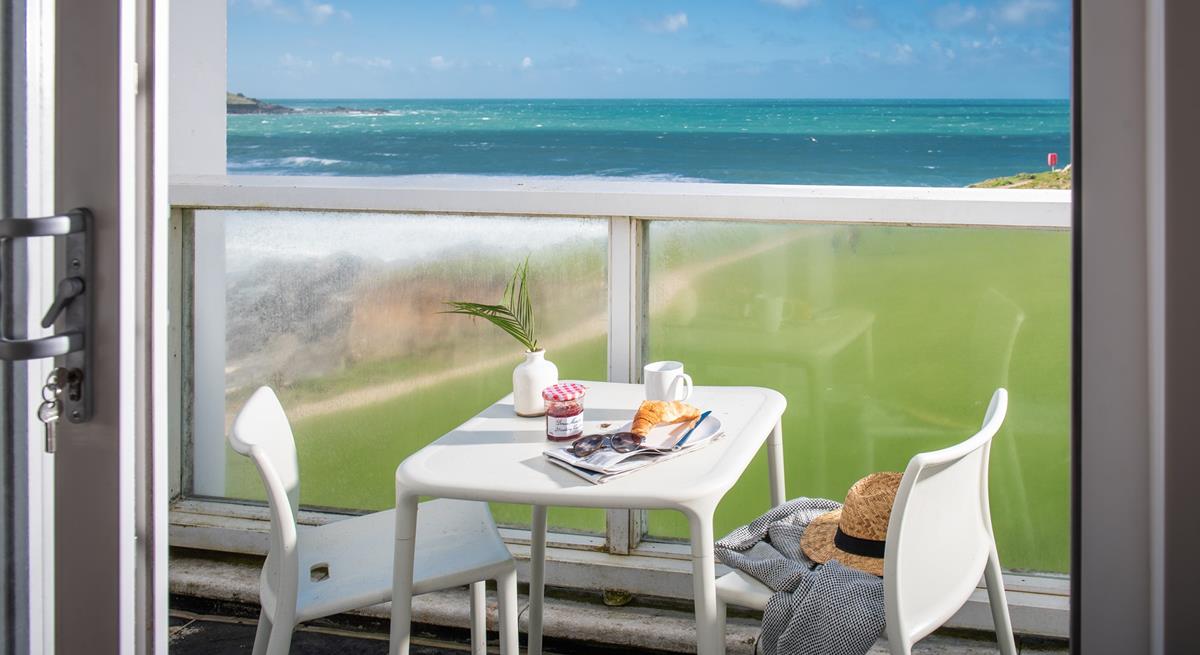 Start the day with pastries on the balcony with a sea view.