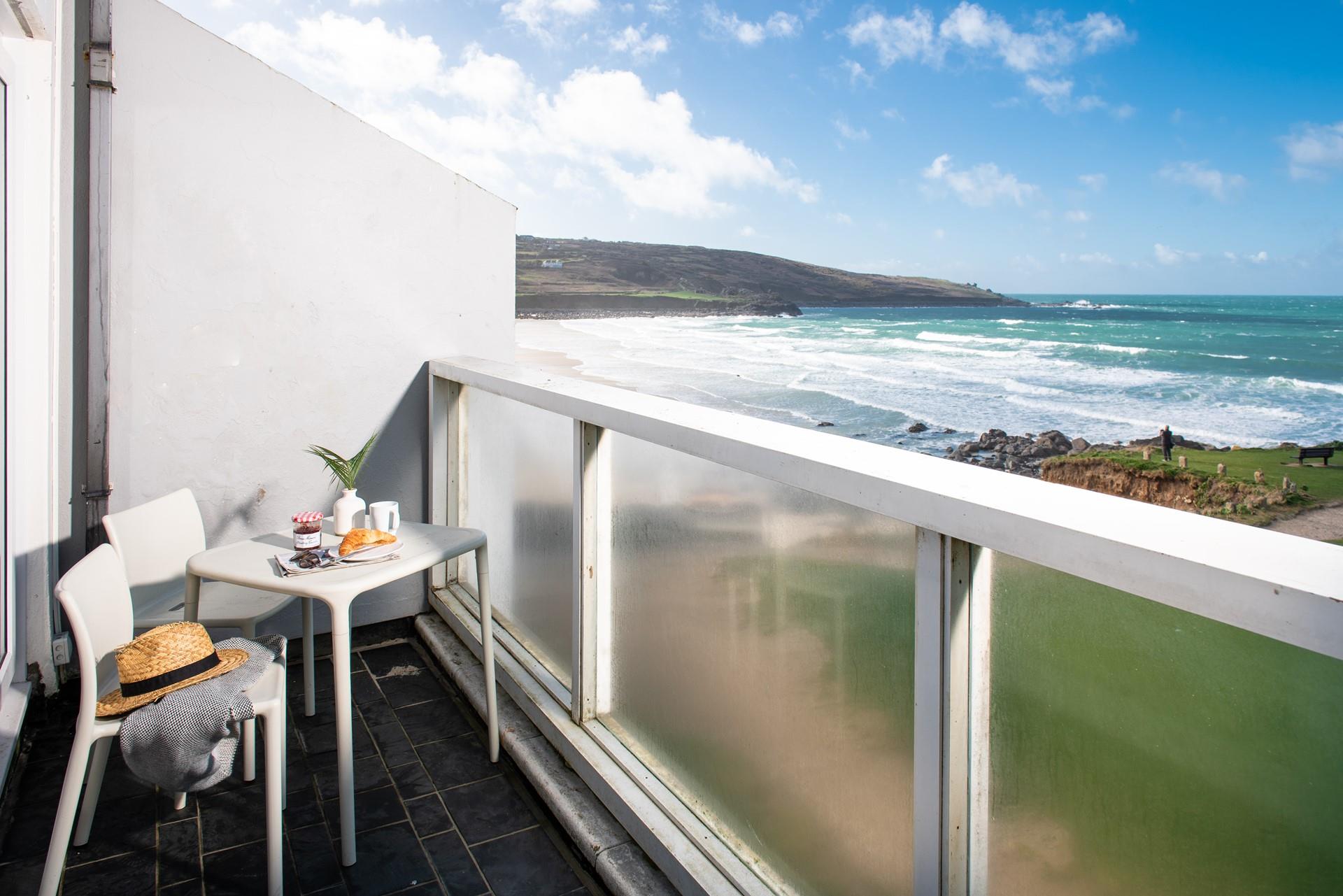 Watch the waves roll in and out on a gorgeous summer's day.