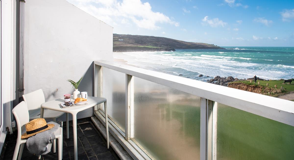 Watch the waves roll in and out on a gorgeous summer's day.