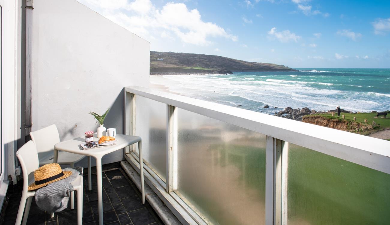 Watch the waves roll in and out on a gorgeous summer's day.