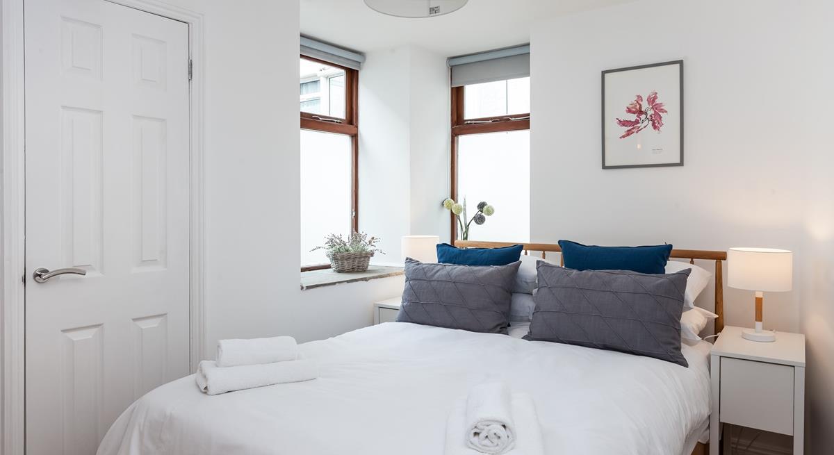 The cosy double bedroom also has an en suite shower room. 