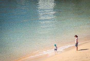 Treat yourself to an early morning stroll along the golden beach.