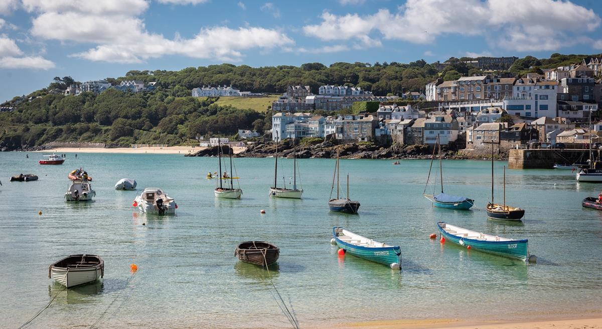 Grab yourself a hot drink from a local cafe and enjoy watching the comings and goings of the harbour.
