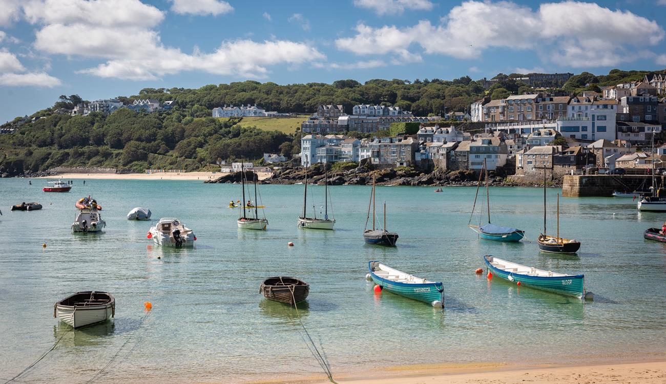 Grab yourself a hot drink from a local cafe and enjoy watching the comings and goings of the harbour.