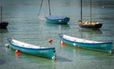 Be enchanted by the sea as you watch the waves lap against the harbour and the boats gently bobbing along. - Thumbnail Image