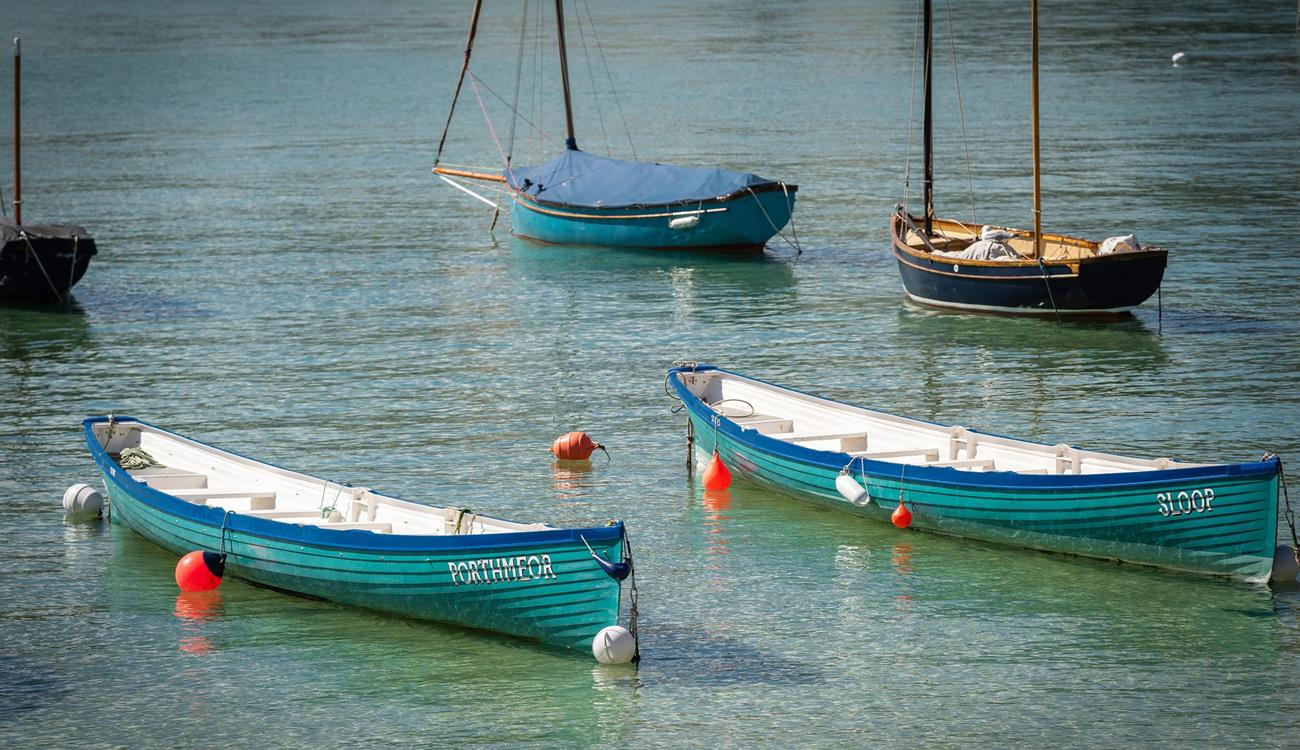 Be enchanted by the sea as you watch the waves lap against the harbour and the boats gently bobbing along.