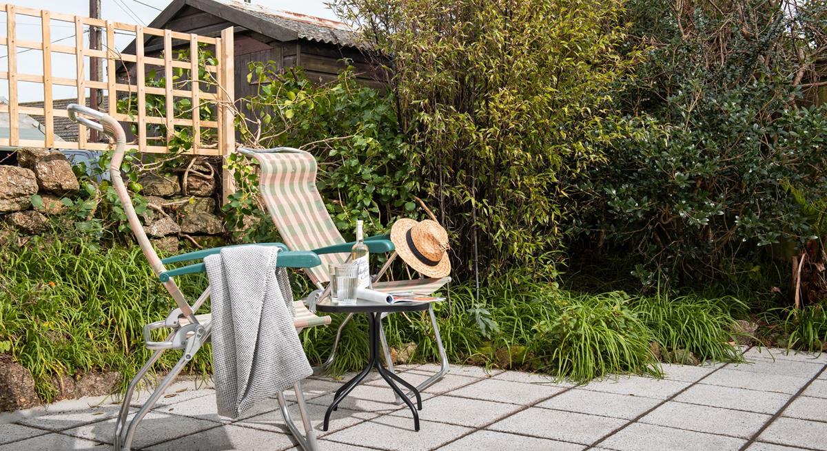 Pour yourself a drink, grab a book and take a moment to relax on the patio in the garden.