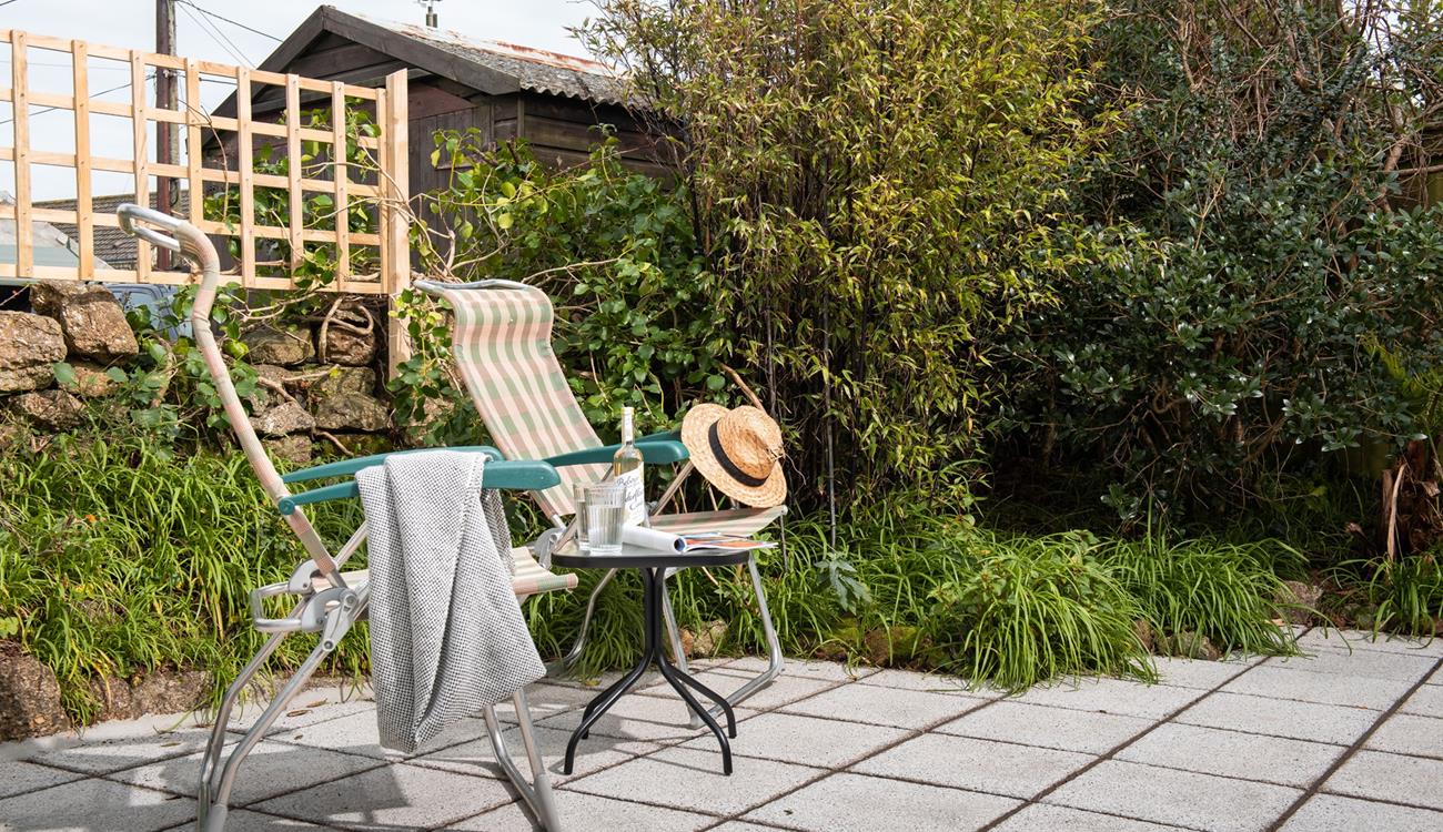 Pour yourself a drink, grab a book and take a moment to relax on the patio in the garden.
