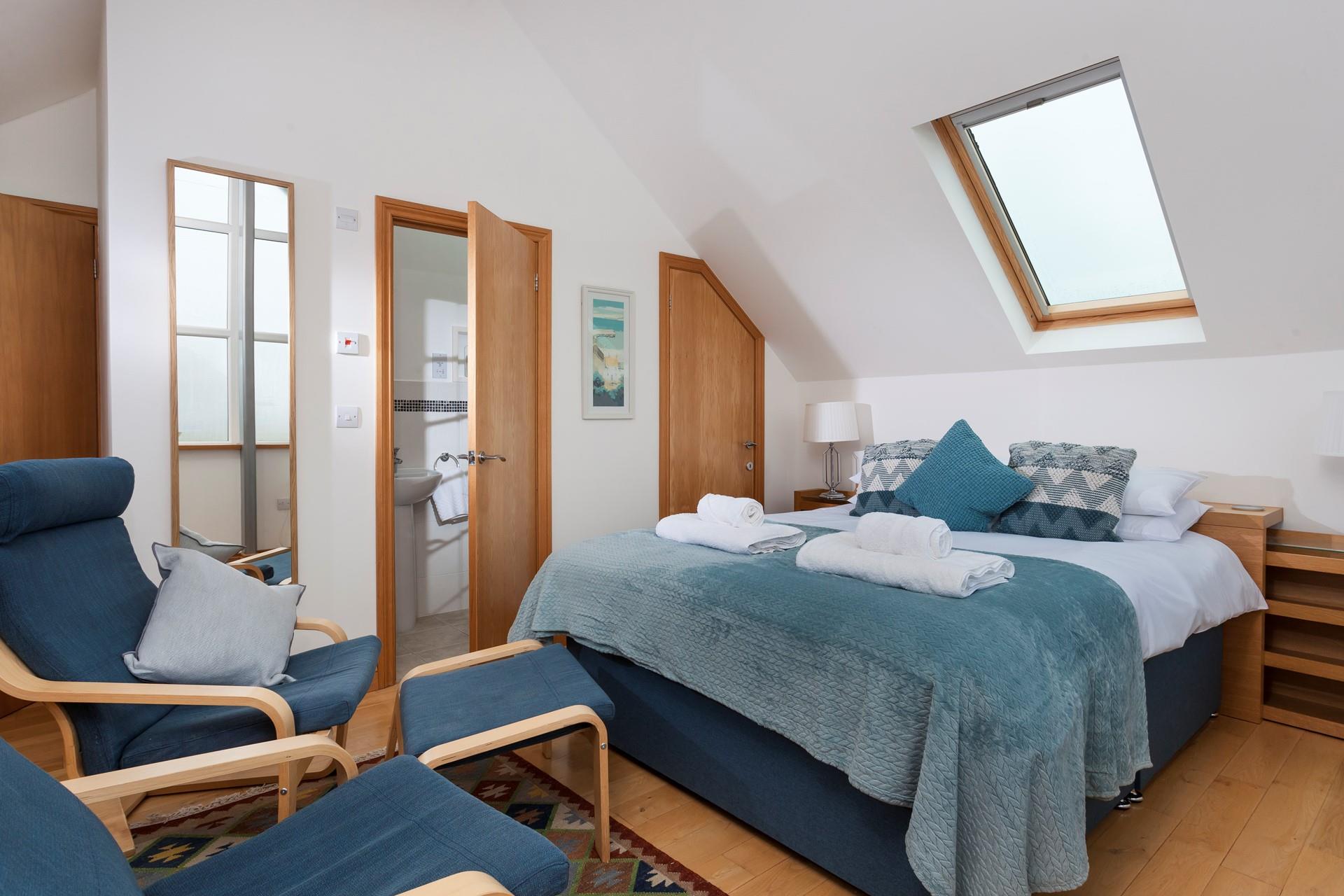 Bedroom 2 is light and spacious and benefits from an en suite.