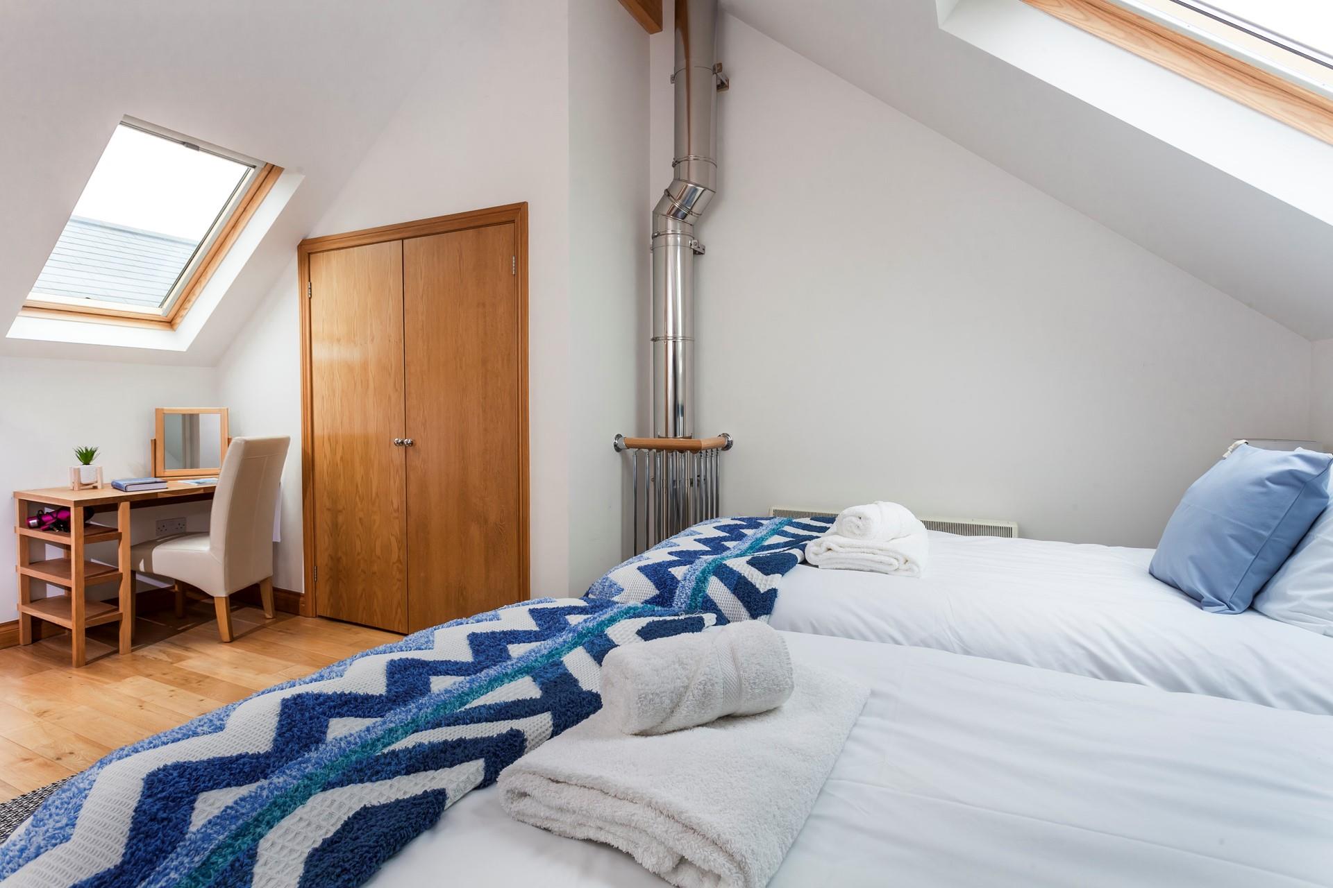We love how the A-frame ceiling and skylights create a light and spacious area. 