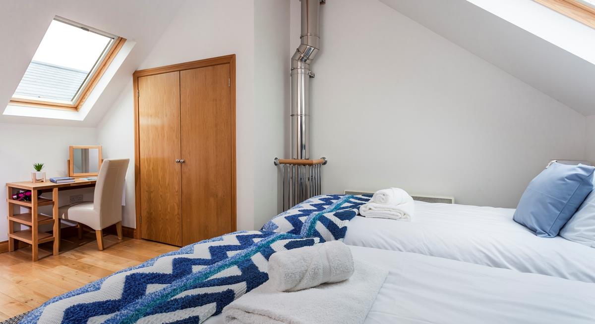 We love how the A-frame ceiling and skylights create a light and spacious area. 