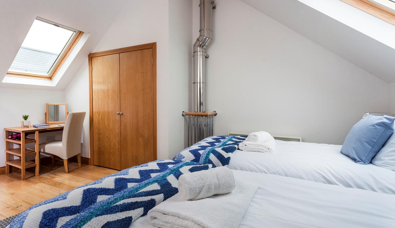 We love how the A-frame ceiling and skylights create a light and spacious area. 