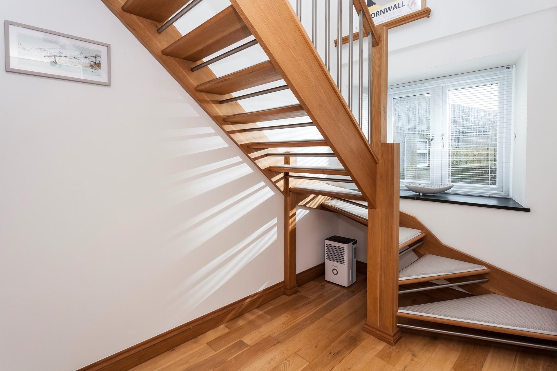 We love how the open staircase allows the light to stream through.