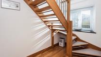 We love how the open staircase allows the light to stream through.