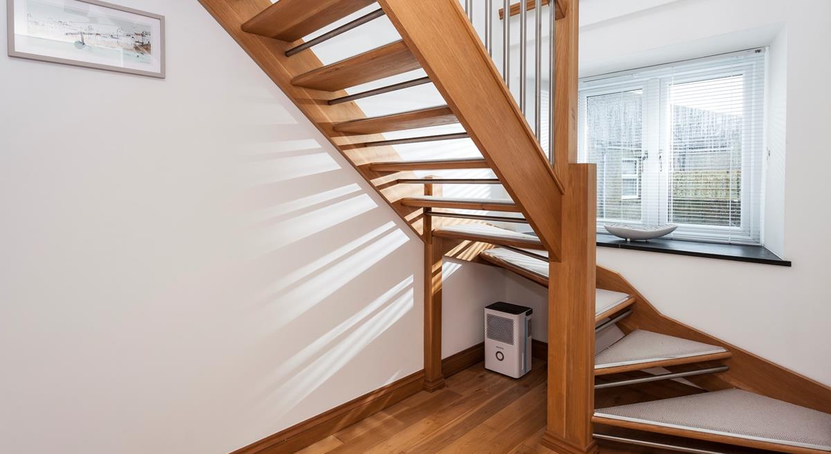 We love how the open staircase allows the light to stream through.